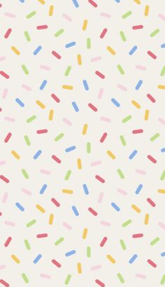 colorful sprinkles on a white background that looks like something out of a book