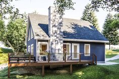 a small blue house sitting on top of a lush green field