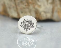 Sterling silver lotus flower ring Artisan handmade  Rustic style Charm:15 mm 14 gauge sterling silver half round band -Please choose your size at check-out --Please check shipping options before you order-- All metals used: 925 sterling silver, 999 fine silver, 14K gold All gemstones are semiprecious All of my jewelry comes nicely packaged I am open to making custom pieces Please click here to visit shop: https://www.etsy.com/shop/NatureJourney Thank you for visiting! Spiritual Sterling Silver Flower Ring, Handmade Spiritual Flower Ring, Sterling Silver Spiritual Flower Ring, Lotus Flower Ring, Women Flower, Handmade Rings, Flower Ring, Handmade Artisan, Lotus Flower