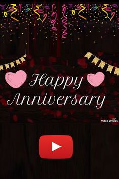 a happy anniversary message with hearts and streamers on a dark background, surrounded by confetti