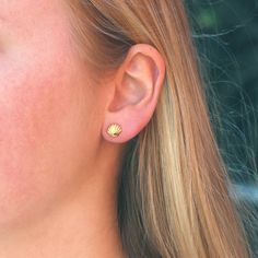 Embark on life's journey with our Seashell Stud Earrings. Radiating eternity, strength, and calm vibes, these coastal treasures come in 18K gold vermeil. Size is approximately 8mm. Elevate your style and embrace relaxation with these stunning symbols of life's endless beauty. Shell-shaped Yellow Gold Earrings Gift, Yellow Gold Shell-shaped Earrings Gift, Shell-shaped Yellow Gold Earrings For Gifts, Life Symbol, Mini Rodini, Gift Accessories, Jewelry Bags, Hair Jewelry, Sales Gifts