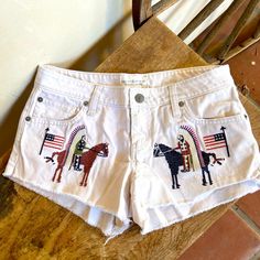 Ralph Laurendenim & Supply Hand Embroidered Of American Indian, Horses, Usa Flags White Distressed Denim Shorts. Woman’s Size 27. Vintage New Without Tags! Very Rare!!! Measurements: Approximate Across Waist: 15” Across Hips: 19” Front Rise: 9” Back Rise: 13” Leg Opening: 11 1/2” ***Purchased These A Number Of Years Ago For My Daughter. She Never Wore Them. ***New Without Tags. ***From A Smoke Free Home. ***Please See Pictures & Measurements. ***These Are Very Rare And I’m Firm On Price. ***Feel Thrift Wishlist, American Flag Shorts, Indian Horses, Ralph Lauren Denim, Ralph Lauren Shorts, Lauren White, Denim And Supply, Distressed Denim Shorts, American Indian