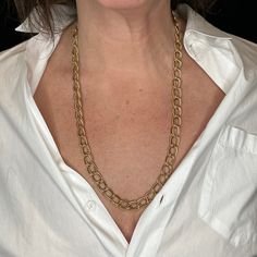 This modern 14k yellow gold chain necklace has a beautiful feel. At twenty-five inches in length, this necklace is able to be doubled up around the neck or just worn as a single stand. The ease of the necklaces design makes it an excellent way to dress up any outfit. Elegant Gold Oval Link Chain Necklace, Timeless Formal Chain Necklace With Adjustable Chain, Formal Gold Plated Oval Link Necklace, Elegant Long Necklace With Cable Chain, Elegant Gold Plated Oval Link Chain Necklace, Gold Plated Oval Link Necklace For Formal Occasion, Elegant Gold-plated Oval Link Chain Necklace, Elegant 14k Gold Link Chain Necklace, Elegant Gold Chain Necklace With Oval Links