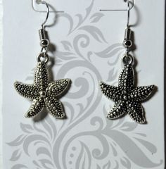 Starfish Dangle Earrings Starfish  Jewelry Starfish  sea life marine beachCharms  Earrings Silver Plated Fish Hooks Nickle and Lead Free by 12ThirtyFive on Etsy Nickel-free Starfish Earrings As Gift, Nickel-free Starfish Jewelry For Beach, Silver Ocean-inspired Earrings With Starfish Charm, Ocean-inspired Drop Earrings With Starfish Charm, Ocean-inspired Starfish Charm Earrings, Starfish Jewelry, Crystal River, Fish Hook, Hand Made Jewelry