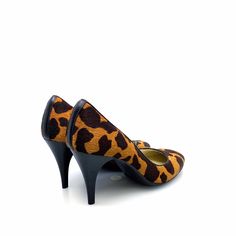 Step into elegance and style with the Talbots Womens Size 7AA Brown Animal Print Stiletto Heels Pumps. These stunning heels are designed for the modern woman who values both fashion and comfort. The rich brown color, adorned with a chic animal print pattern, adds a touch of wild sophistication to any outfit. Crafted from high-quality faux animal hair, these pumps not only elevate your look but also provide a soft, luxurious feel against your skin. Perfect for casual outings or special occasions, Brown Low Heel Padded Heels, Brown Low Heel Shoes With Padded Heel, Brown Low Heels With Padded Heel, Brown Closed Toe Kitten Heels With Padded Heel, Brown Kitten Heels With Sculpted Heel And Round Toe, Brown Kitten Heels With Almond Toe, Trendy Brown Heels For Work, Brown Heels With 4-inch Heel For Party, Brown Court Shoes With 4-inch Heel For Evening