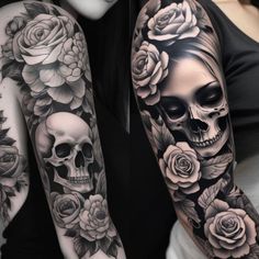 two women with tattoos on their arms, one has roses and the other has a skull