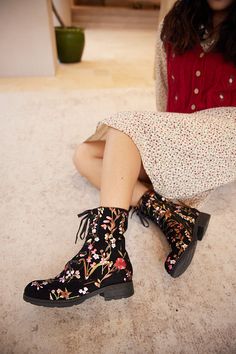 Step into style with Soffia's Plum Blossom Thermoprint Combat Boots. These boots feature a unique thermoprint design inspired by blooming plum blossoms, adding a touch of whimsy to your outfit. Take on any adventure with these statement-making boots. Available in both red and blue prints. 0.98'' heel 5.2 shaft 10.2 circumference Zip / lace-up closure Suede upper Leather / Textile lining Leather footbed Leather midsole Leather insole Rubber sole Winter Floral Print Boots, Fall Floral Print Boots With Round Toe, Casual Boots With Floral Embroidery And Round Toe, Spring Floral Embroidered Multicolor Boots, Fabric Boots With Round Toe For Winter, Spring Flat Heel Boots, Fabric Winter Boots With Round Toe, Red Embroidered Winter Boots, Casual Winter Boots With Floral Print