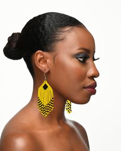 Beautifully handmade  Maasai beaded earrings. Made from high-quality glass seed beads. Length :8.5cm Width :2.5cm Weight:6g Traditional Yellow Handwoven Beaded Earrings, Handwoven Yellow Beaded Earrings With Round Beads, Yellow Handwoven Beaded Earrings With Round Beads, Yellow Beaded Earrings With Black Beads, Traditional Yellow Beaded Earrings, Traditional Black Beaded Drop Earrings, Traditional Yellow Beaded Earrings With Dangling Beads, Turban Headwrap, Ethnic Earrings