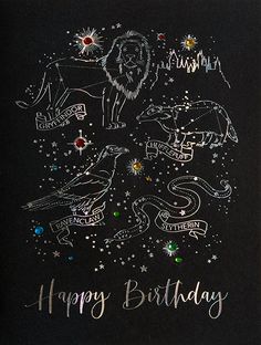 a black birthday card with an image of a lion and other zodiac symbols on it