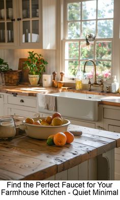 a bowl of fruit sitting on top of a wooden table next to a sink in a kitchen