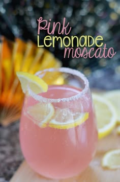 a pink lemonade moscato is garnished with sugar and lemons