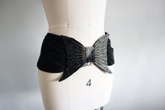 "Carol Van Wyck wide bow belt. Black suede, black and silver beads on the bow.  Made in Canada Size Medium.  28\" waist. The bow is 8\" x 5\"." Elegant Black Corset Belt For Party, Chic Black Corset Belt For Party, Bow Belt, Belt Black, Suspender Belt, Black And Silver, Suspenders, Silver Beads, Black Suede