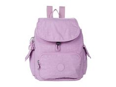 Kipling City Pack Small Backpack - Backpack Bags : Purple Lila : The Kipling City Pack Mini is the perfect sized bag for minimal travel or storage. Its multi-pocketed design creates more storage inside and out! Multi-pocket construction features one exterior zip pocket and one internal. Magnetic snap button and zip closure. Exterior features two snap button pockets and one drawstring pocket. Adjustable shoulder straps for a custom fit. Constructed of 100% polyamide with a polyester lining. Impor Multifunctional Everyday Travel Accessories With Pockets, Versatile Travel Shoulder Bag With Flap, Versatile Flap Shoulder Bag For Travel, Versatile Travel Accessories With Zipper Pocket For Outdoor, Versatile Outdoor Travel Accessories With Zipper Pocket, Functional Rectangular Travel Accessories With Pockets, Rectangular Functional Travel Accessories With Pockets, Multifunctional Travel Bag With Multiple Pockets, Modern Bags With Side Pockets For Everyday