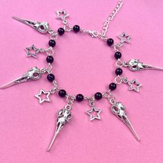 Silver Bird Skull Gothic Charm Bracelet This lovely goth / witch style charm bracelet features star charms and ravel skull charms. Please select the length in which you would like the bracelet. A 5cm extender chain will be added to this length so that the bracelet can fit you perfectly. SHIPPING ♥ All items are dispatched within 1 working day. ♥ For Irish customers, shipping is sent using standard delivery and is free. If you would like a tracking number so that you can know the location of your Goth Bracelets, Witch Bracelet, Witch Style, Goth Witch, Gothic Bracelet, Trad Goth, Raven Skull, Silver Bird, Witch Fashion