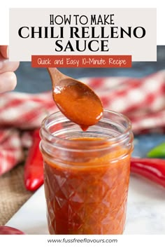 how to make chili relleno sauce in a jar with a wooden spoon on top