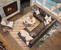 a living room filled with furniture and a fire place