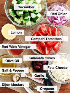 the ingredients for cucumber, lemon, tomato, red wine vinegar, olives, feta cheese and garlic