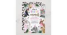 an animal themed birthday party with zebras, giraffes and palm leaves