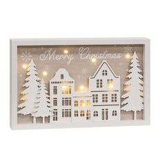 a white christmas card with trees and lights in the shape of a house that says merry christmas