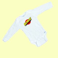 "BAZINGA" From The Big Bang Theory Logo   Funny Long Sleeve Onesie Custom printed onesie, Great Baby Shower Gift Gerber brand Onesie 100% cotton Fast Shipping by USPS First Class Mail We Make and Ship within 24 hrs of the order Some people say they may size a little small so you may wish to order 1 size larger 100% Customer Satisfaction!! We also offer Personal Text or Picture Onesies in our other auctions Feel free to email us with any questions Cotton Long Sleeve Shirt With Branding, White Long Sleeve Shirt With Branding, Customizable Funny White Onesie, White Short Sleeve Onesie With Character Print, Funny Customizable Short Sleeve Onesie, Starwars Onesies, Nerdy Onesies, Long Sleeve Onesie, Baby & Toddler Clothing