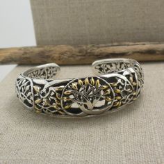 "Petite Tree of Life Bangle in Sterling Silver with 18K Accents. 2\" across a little less than a size 6 Front of Bracelet 5/8\"  Delicate Trees to the ends of the bangle. Nicely boxed for gift-giving with silver cloth Hinge opening. Keith Jack Jewelry Ships in 3 to 5 days. Ships Free within the USA 21 Day Returns Items must be returned in new unworn condition." Luxury Adjustable Sterling Silver Bracelet For Gifting, Luxury Adjustable Sterling Silver Bracelet For Gift, Luxury Adjustable Sterling Silver Bracelet As Gift, Spiritual Bracelet With Polished Finish As Gift, Silver Heirloom Bangle As Gift, Silver Heirloom Bangle For Gift, Unique Cuff Bracelet With Oxidized Finish As Gift, Heirloom Style Silver Bangle As Gift, Unique Oxidized Finish Cuff Bracelet For Gift