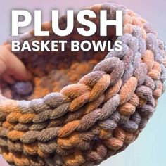 a close up of a person holding a basket with yarn on it and text that reads, plush basket bowls