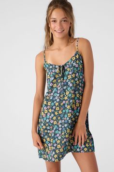 O'Neill Girl's Woven Tank Dress 24 3/4" In Length V-neckline with center front bow Encased back elastic Allover print 100% Viscose 30s Flat Cut Clothes, Beanie Style, Girls Rompers, Active Wear Leggings, Tank Dress, Simple Dresses, Spring Outfits, Jumpsuit Dress, Floral Dress