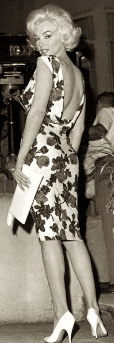 a woman in a dress and high heels