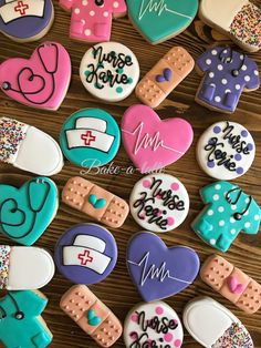 decorated cookies are arranged in the shape of heart, nurse's and medical symbols