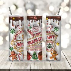 three different flavors of hot chocolate with christmas decorations on the wrapper and in front