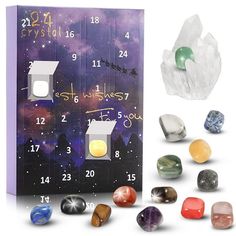 an assortment of rocks and crystals in front of a purple box with the numbers on it