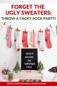 a christmas party with stockings hanging on the clothes line and cookies in front of it