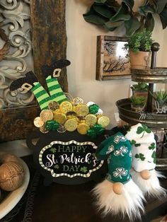 st patrick's day decorations are displayed on a table