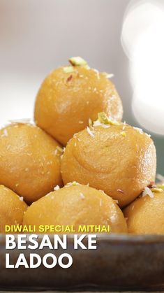 there is a bowl full of ladoos with the words diwali special mithan besan ke lado