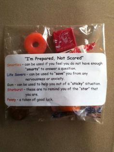 there is a bag with some candy in it and a note attached to the package