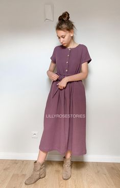 Long dress made of high quality double gauze fabric. Front fastening with cocounut buttons. Short  sleeve. Side pockets.  Loose fit. Matching belt is added. You can buy the matching children's dress here: https://www.etsy.com/listing/1333429354/girls-double-gauze-dress-winter-moss?click_key=64835348e0c4fa9a7034d6e28e2a0f162ea83b9d%3A1333429354&click_sum=9db1b7b5&ref=shop_home_recs_14&crt=1&sts=1 XS/6-8  bust 30 1/2"- 31 1/2", waist 23"-24", hip 32 1/2" - 33 1/2" bust 78-80cm, waist 58-61cm, hip Grape Color, Dress Winter, Double Gaze, Double Gauze Fabric, Gauze Dress, Woman Dress, Childrens Dress, Gauze Fabric, Double Gauze