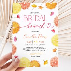 a hand holding up a card with orange slices on it and the words bridal bridal