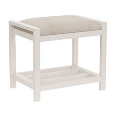 a white stool with a cushion on the top and bottom shelf for storage or display