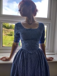 This 18th century inspired dress has a fitted bodice and half sleeve's that are trimmed with delicate white lace and fastens at the front with hook and eye closures. The full-length skirt is gathered at the sides and back with pockets big enough to fit your smart phone, fastening into place with a ties and press studs. Hand made to order out of 100% cotton with a simple white floral print. Comes in a selection of colors. Perfect for historical reenactment, LARP, special occasions or if you just prefer a more alternative way of dressing. the lace will vary as it is hand sourced.  COOL WASH ONLY! 1700s Dresses, Ciel Black Butler, Blue Dress Floral, 19th Century Dresses, 1900s Dress, Cottage Core Dresses, Floral Dress Long, Dress Cottage, Farm Dress