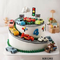 a birthday cake with cars and traffic lights on it