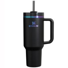 a black travel mug with the name stanley on it