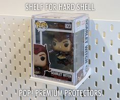 a pop vinyl figure in a box on a shelf