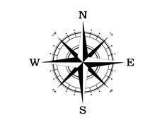 a black and white image of a compass