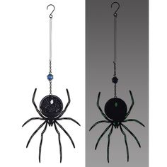 two different types of spider ornaments hanging from chains