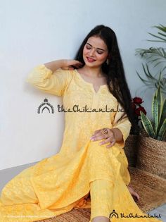 Thechikanlabel yellow cotton kurta sharara set lucknawi chikankari kurtaDisclaimer : : Motifs of embroidery may vary as the images shown are for illustration purpose.PRODUCT SPECIFICATIONSKurti Fabric : Chanderi CottonSleeves : 3/4 SleevesStyle : Straight KurtiLength : 44-46 InchesOccasions : Casual Wear, Office Wear, Festive WearGarment Care : Hand Wash OnlyPrice Includes : As per choicePRODUCT FEATURESFlawless finishingElegant looksAlluring patternsSoft and Skin friendlyBest for summers Trivia Unstitched Yellow Mulmul Sharara, Yellow Unstitched Mulmul Sharara, Yellow Mulmul Sharara With Dabka Work, Yellow Sharara With Dabka Work In Mulmul, Yellow Mulmul Sharara For Wedding, Yellow Mulmul Sharara For Diwali, Yellow Chikankari Embroidery Sharara For Eid, Yellow Chikankari Sharara For Eid, Anarkali Sharara With Chikankari Embroidery For Summer