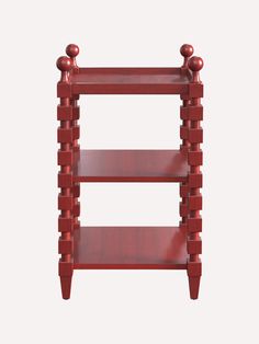 a red shelf with three shelves on each side