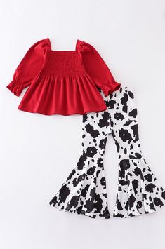 Look purrfectly stylish with this red shirt and cow print ruffle girl bell bottom set! With its vibrant colors and ruffled details, it's sure to make any girl stand out! (In a fun, fashionable way, of course!) Casual Ruffle Hem Sets For Spring, Casual Spring Sets With Ruffle Hem, Cute Red Sets For Fall, Playful Red Ruffled Sets, Spring Red Ruffled Sets, Red Fitted Tops Matching Set, Playful Red Fitted Sets, Playful Red Fitted Set, Playful Fitted Red Sets