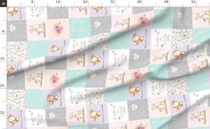 an image of a fabric with flowers and words on the front, in pastel colors