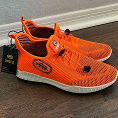 Ecko Unltd. Sport Slip On Mesh Orange Neon Sneakers Size 9 Orange Low-top Running Sneakers, Orange Slip-on Sneakers With Rubber Sole, Breathable Orange Slip-on Sneakers, Orange Low-top Synthetic Running Shoes, Orange Slip-on Running Shoes With Rubber Sole, Neon Sneakers, Ecko Unlimited, Orange Neon, Black Orange