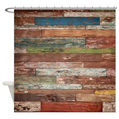 a shower curtain with wooden planks painted on the side and green, blue, yellow, red, orange